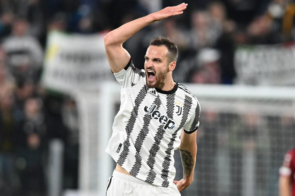 Juventus's Federico Gatti celebrates scoring the late 1-1 equaliser goal.