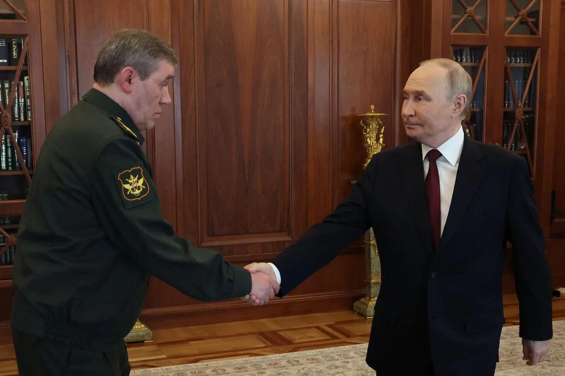 Russian President Vladimir Putin meets with Chief of the General Staff of the Russian Armed Forces Valery Gerasimov in Moscow on April 19.