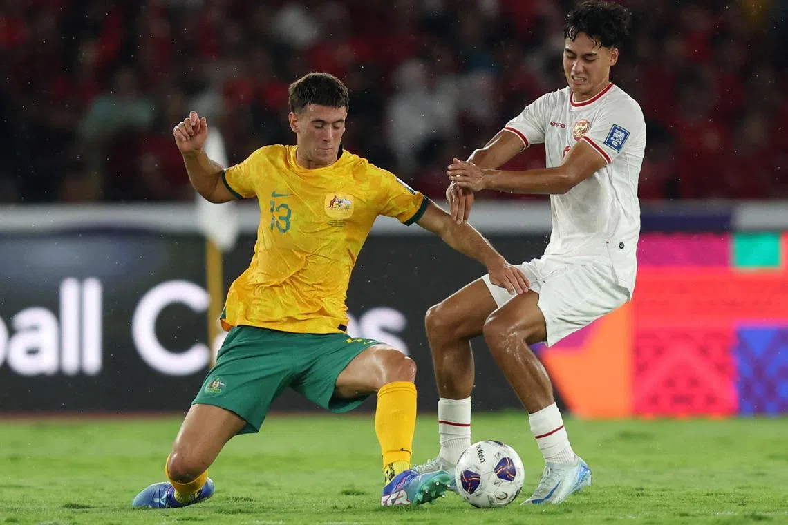 Indonesia's Rafael Struick in action with Australia's Alessandro Circati during their World Cup qualifier.