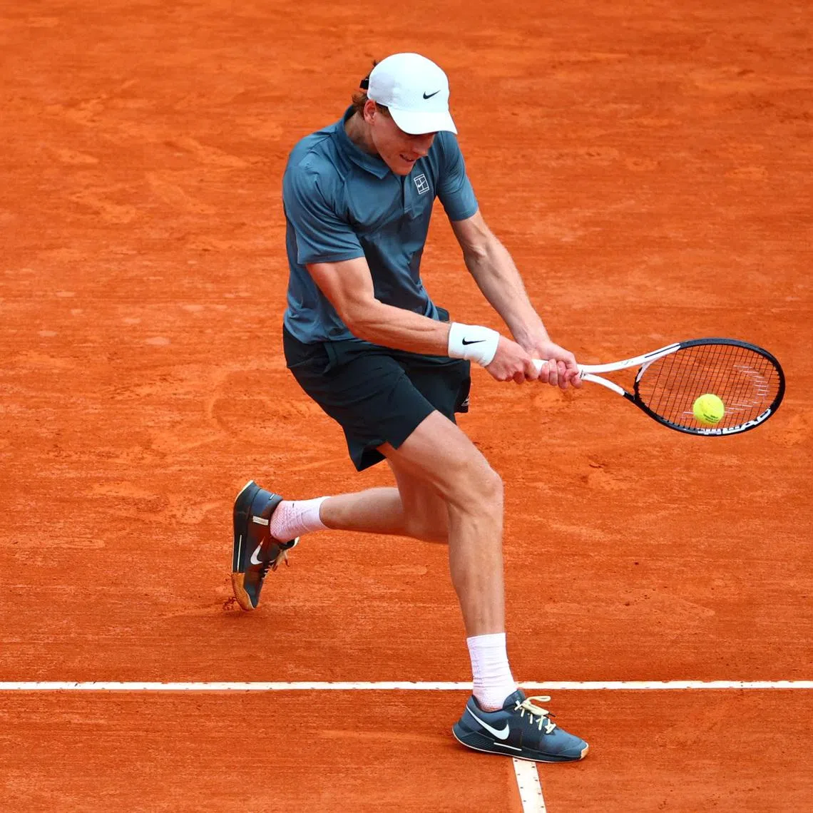 Tennis - ATP Masters 1000 - Monte Carlo Masters - Monte Carlo Country Club, Roquebrune-Cap-Martin, France - April 12, 2026 Italy's Jannik Sinner in action during his final match against Spain's Carlos Alcaraz REUTERS/Manon Cruz