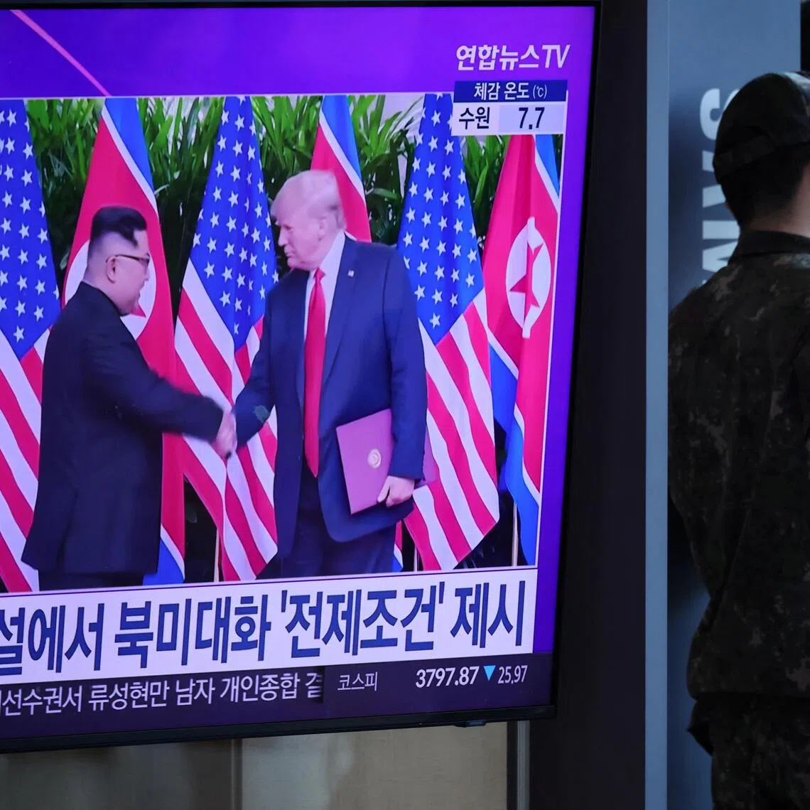 A TV in South Korea's Seoul on Oct 22, broadcasting a news report on a possible meeting between North Korean leader Kim Jong Un and US President Donald Trump.