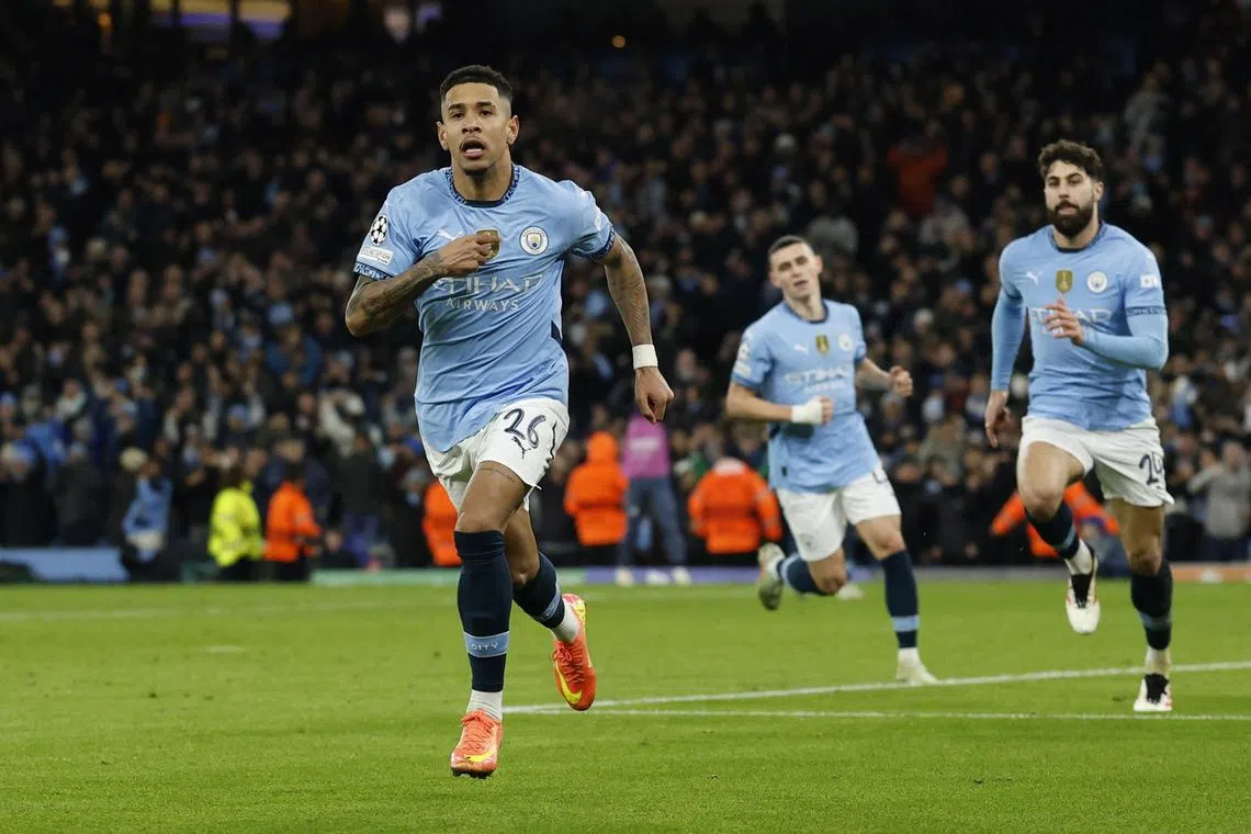 Manchester City's Savinho celebrates scoring their third goal.