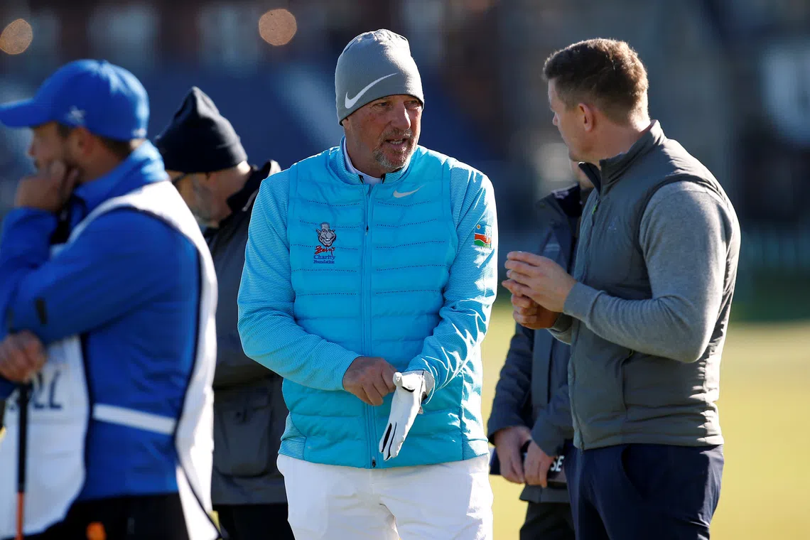 Golf - European Tour - Alfred Dunhill Links Championship - St Andrews, Britain - October 7, 2017  Sir Ian Botham and Brian O'Driscoll during the third round  Action Images via Reuters/Craig Brough