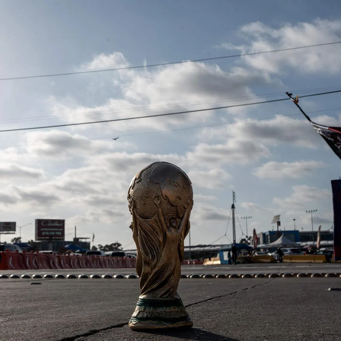 A World Cup trophy souvenir is pictured on a street in Tijuana, Baja California state, Mexico on May 23, 2026. Iran are moving their World Cup training base to Tijuana, Mexico, after football's world governing body FIFA approved a request to transfer it from Tucson, Arizona, the head of Iran's football federation Mehdi Taj said on May 23, 2026.