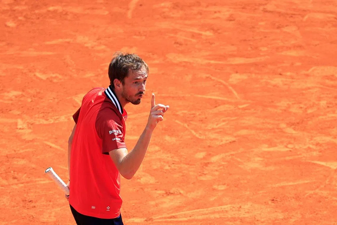 Russia's Daniil Medvedev reacts as he plays against compatriot Karen Khachanov during their Monte Carlo Masters last-16 match.