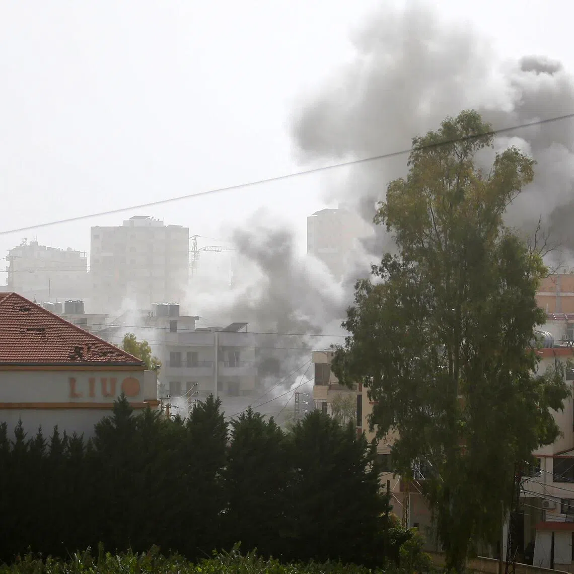 Smoke rises following an Israeli airstrike in the southern port city of Tyre, Lebanon.