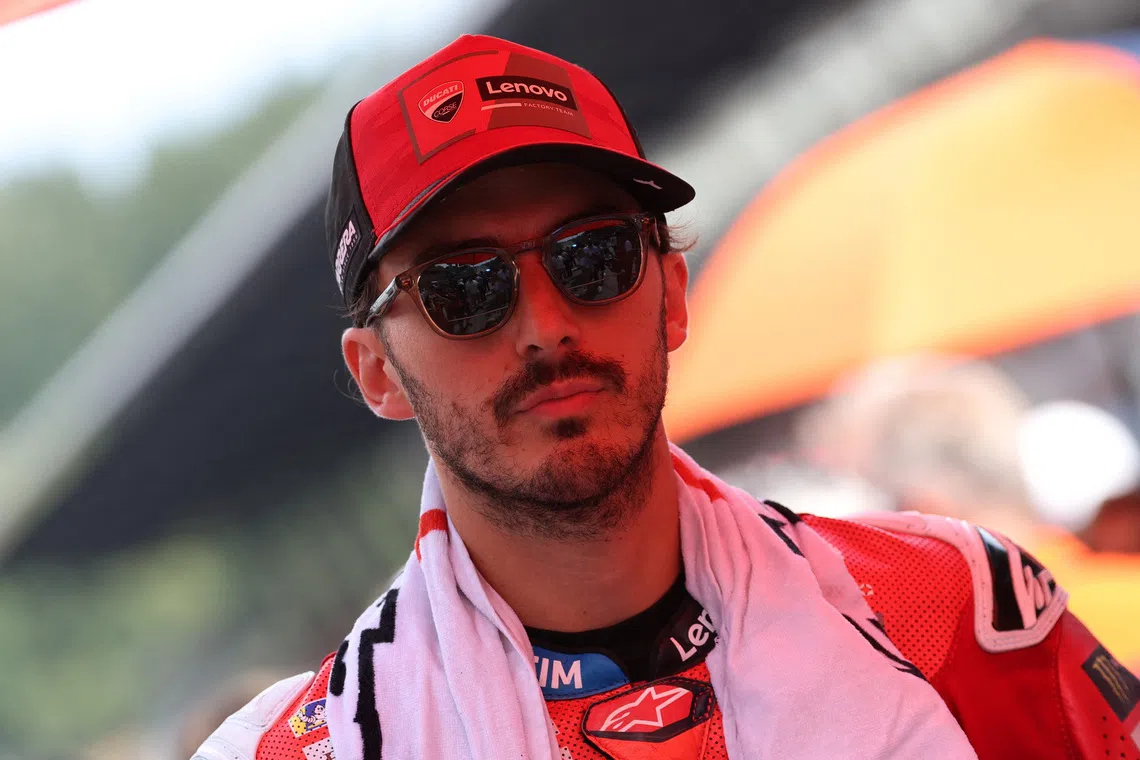 FILE PHOTO: MotoGP - Austrian Grand Prix - Red Bull Ring, Spielberg, Austria - August 16, 2025 Ducati Lenovo Team's Francesco Bagnaia before qualifying REUTERS/Gintare Karpaviciute/File Photo
