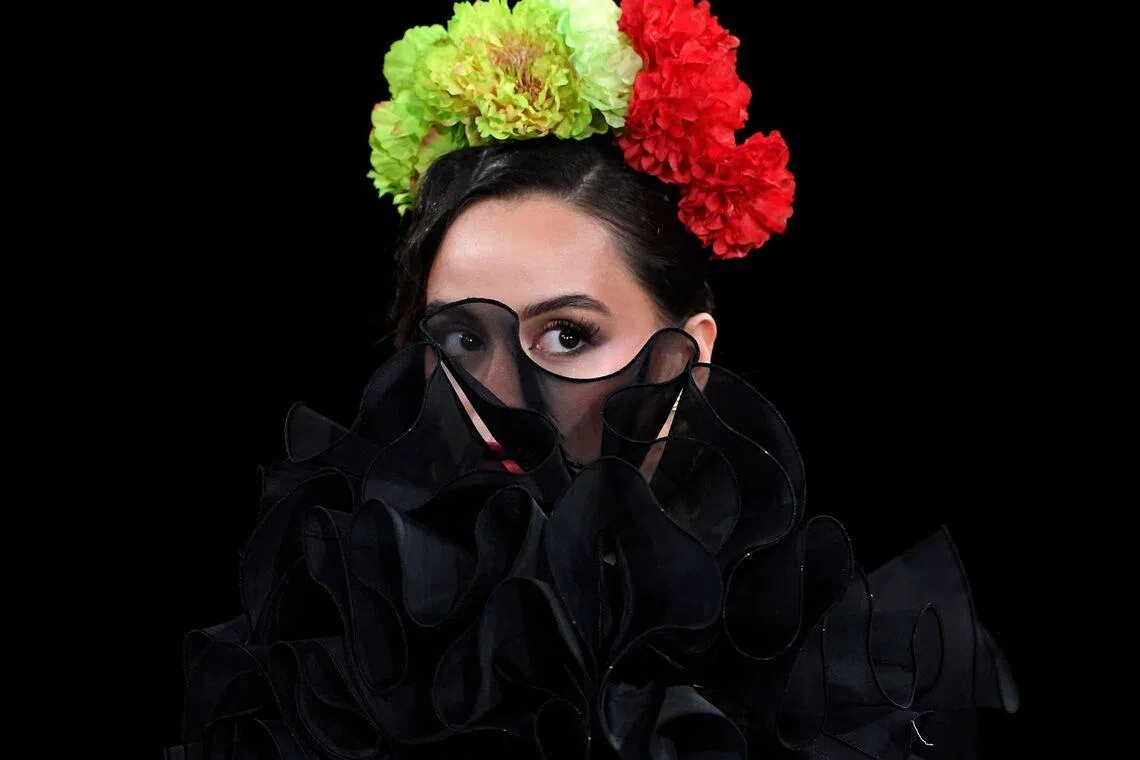 A model presenting a creation by Yolanda Rivas during the International Flamenco Fashion Week in Seville, Spain on Jan 31, 2026. 
