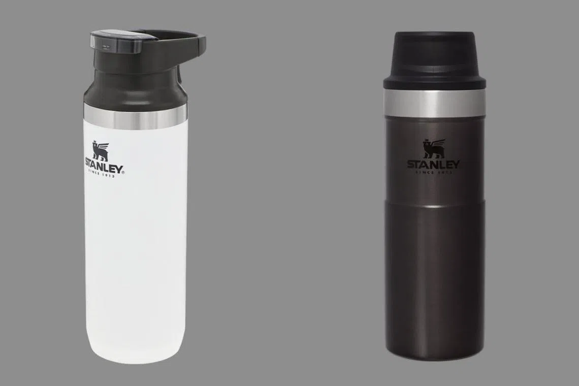 A Stanley Switchback Travel Mug (left) and Stanley Trigger Action Travel Mug.