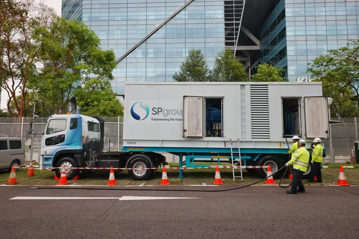 ST20250124_202581300270/gcdefence24/Gabrielle Chan/Jason Quah

SP Group staff demonstrating how they set up a mobile power generator on Jan 24, 2025. ST PHOTO: JASON QUAH