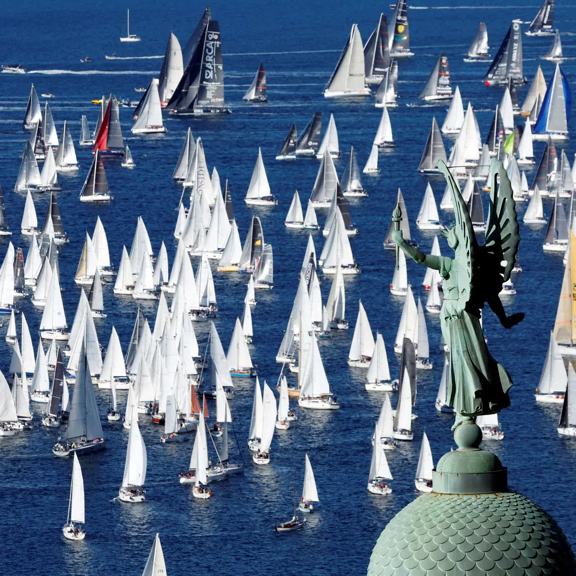Sailing - The Barcolana, the largest sailing regatta in the world - Trieste, Italy - October 11, 2026 General view as the Victory Lighthouse of Trieste is seen during the Barcolana Sailing Regatta REUTERS/Remo Casilli TPX IMAGES OF THE DAY