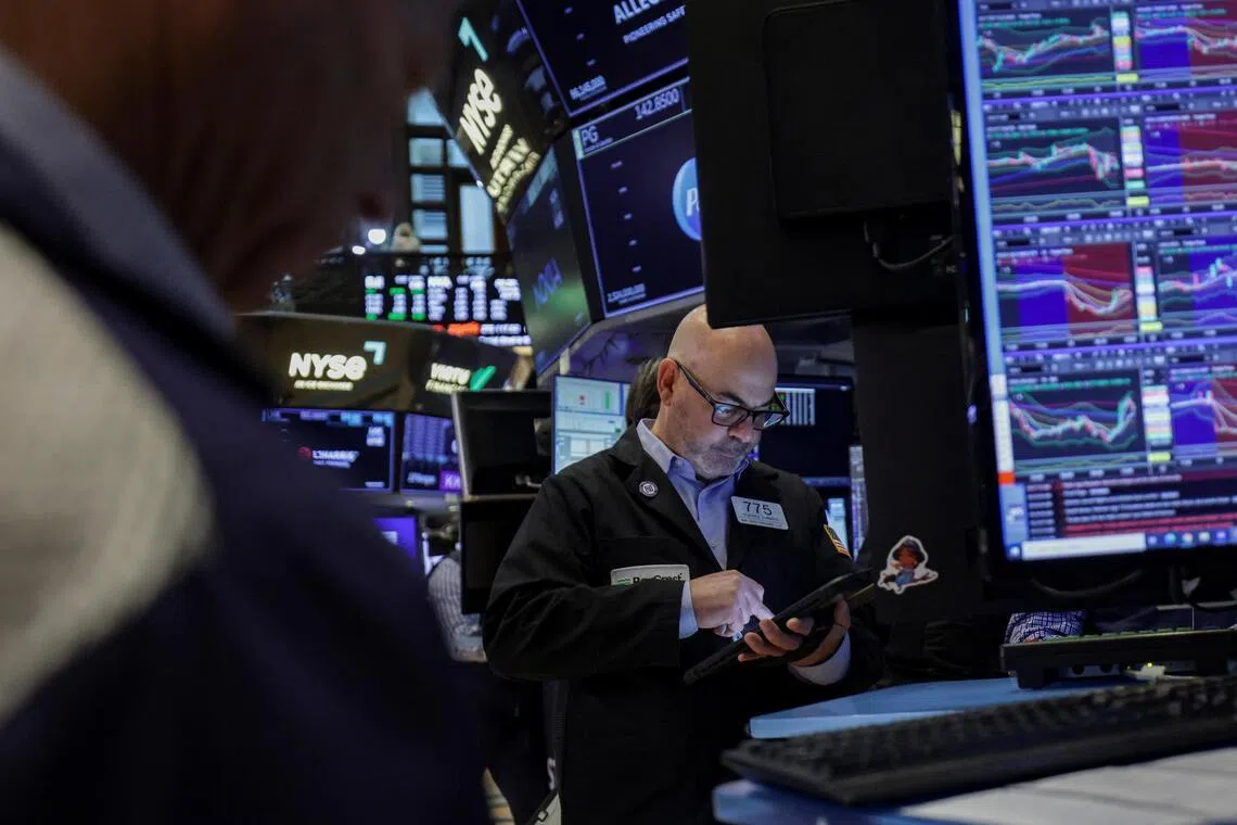 A trader working on the floor of the New York Stock Exchange, in New York City, on April 23.