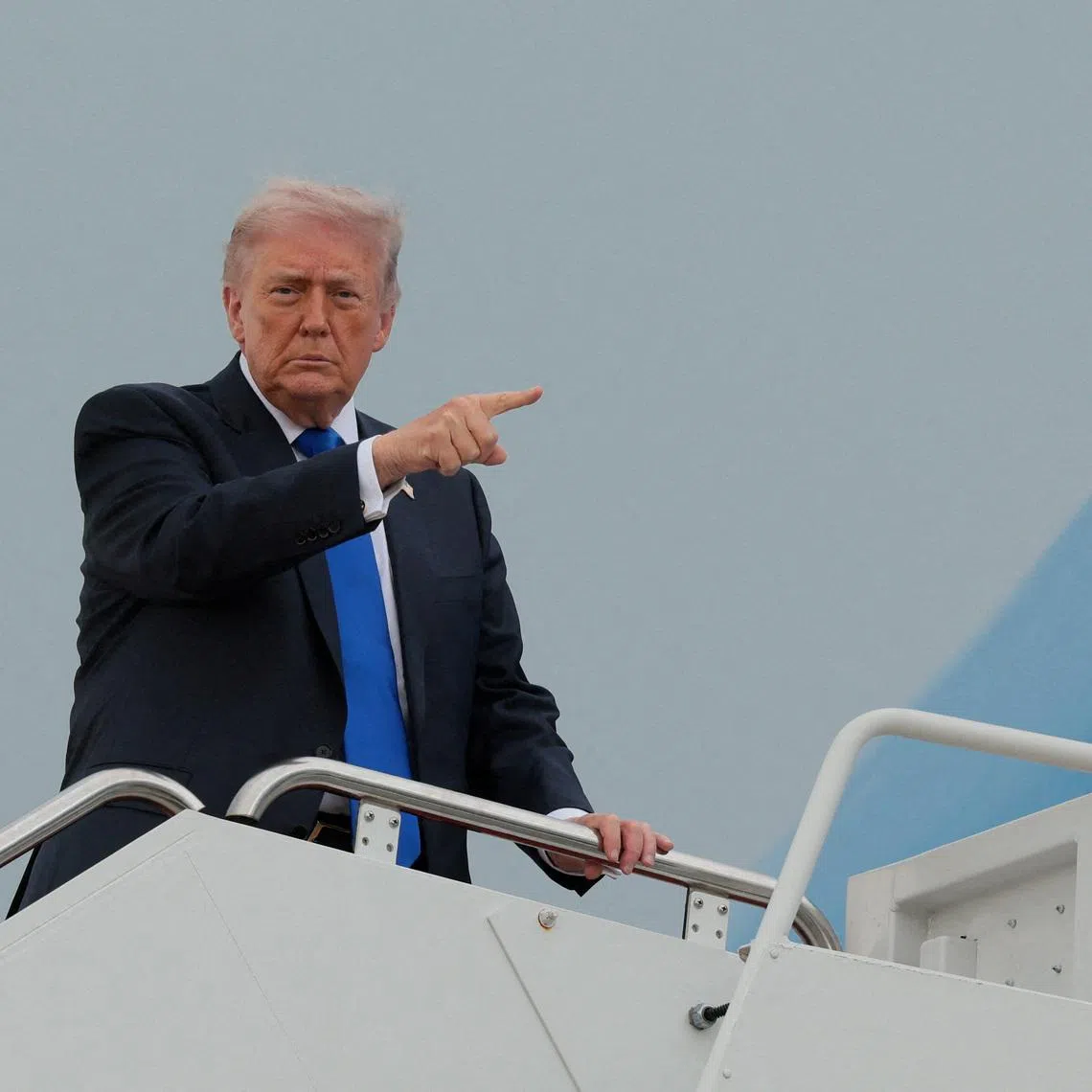 FILE PHOTO: U.S. President Donald Trump boards Air Force One en route to Palm Beach International Airport, at Joint Base Andrews, Maryland, U.S., April 24, 2026. REUTERS/Kylie Cooper/File Photo