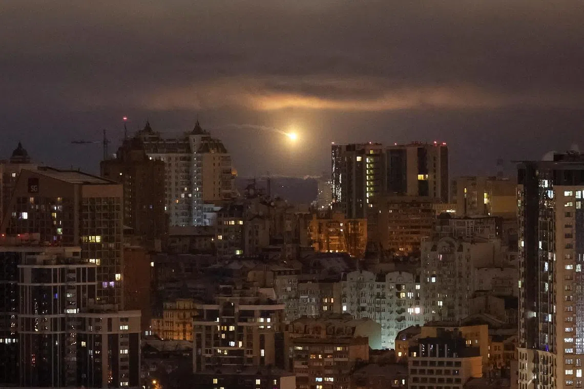 FILE PHOTO: An explosion of a drone is seen in the sky over the city during a Russian drone strike, amid Russia's attack on Ukraine, in Kyiv, Ukraine February 5, 2025. REUTERS/Gleb Garanich/File Photo