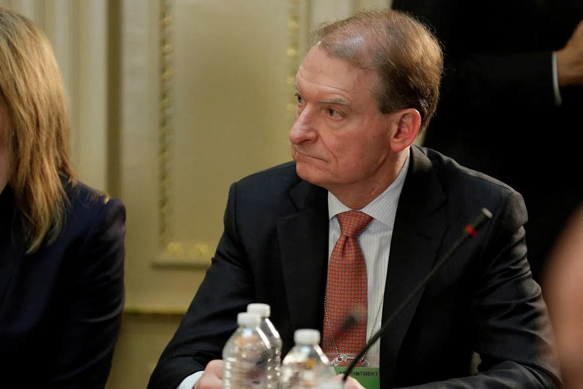 FILE PHOTO: CEO of Patomak Global Partners LLC Paul Atkins takes part in a strategic and policy CEO discussion with U.S. President Donald Trump in the Eisenhower Execution Office Building in Washington, U.S., April 11, 2017.  REUTERS/Joshua Roberts/File Photo