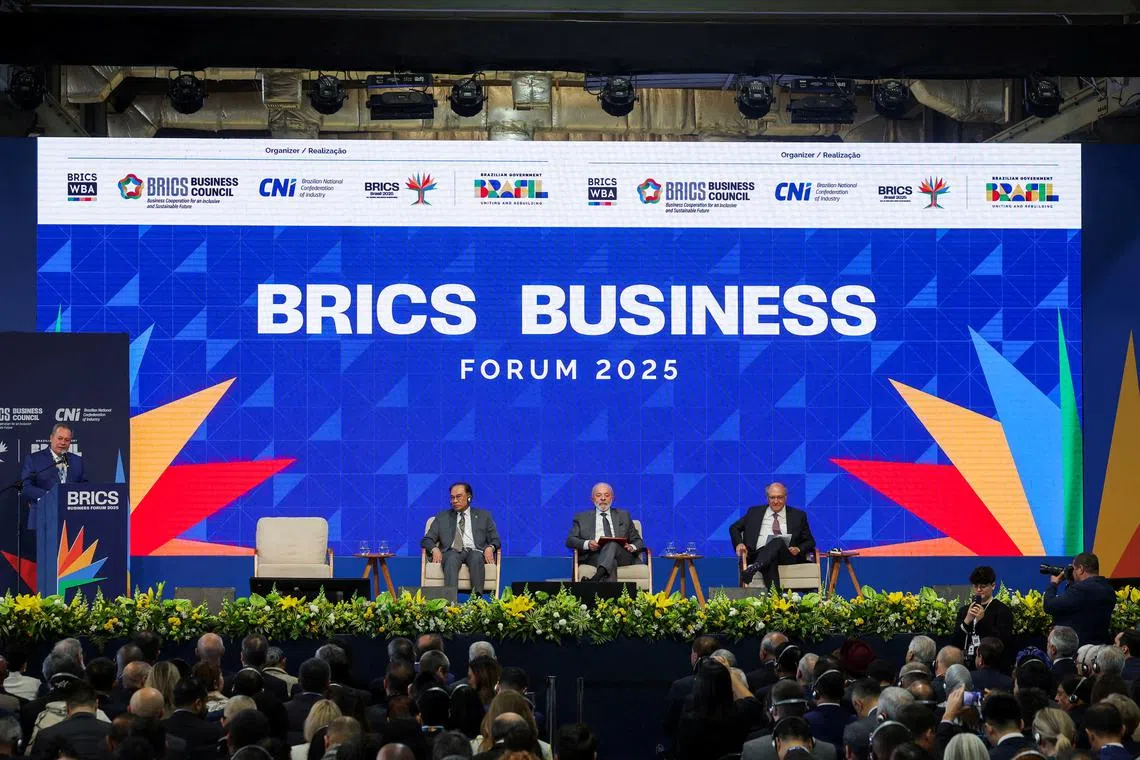 (From left) National Confederation of Industry president Ricardo Alban, Malaysian premier Anwar Ibrahim, Brazilian President Luiz Inacio Lula da Silva and Brazilian Vice-President Geraldo Alckmin at the opening of the Brics Business Forum in Rio de Janeiro on July 5.