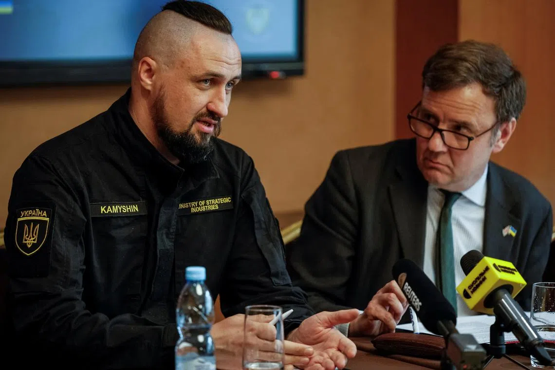 Ukrainian Minister for Strategic Industries Oleksandr Kamyshin speaks at a joint press conference with British Minister for Trade Policy Greg Hands and representatives of the British defence company BAE Systems, amid Russia's attack on Ukraine, in Kyiv, Ukraine, April 8, 2024. REUTERS/Alina Smutko/File Photo