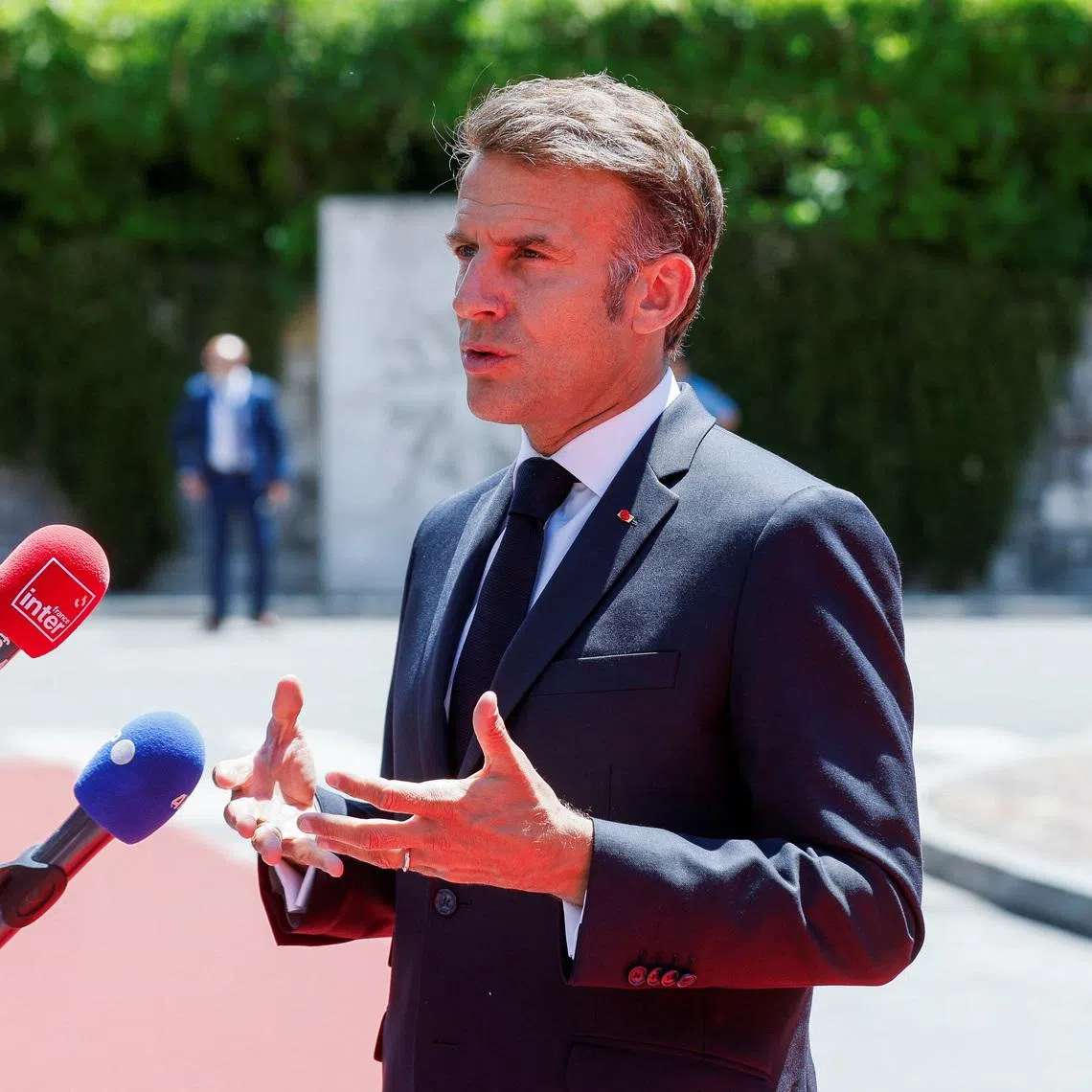 France's President Emmanuel Macron speaks with the media as he arrives for the EU-Western Balkans Summit in Tivat, Montenegro, June 5, 2026. REUTERS/Stevo Vasiljevic