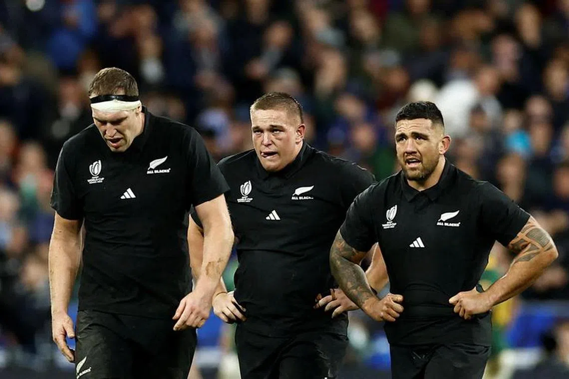 Rugby Union - Rugby World Cup 2023 - Final - New Zealand v South Africa - Stade de France, Saint-Denis, France - October 28, 2023 New Zealand's Ethan de Groot, Brodie Retallick and Codie Taylor react REUTERS/Christian Hartmann