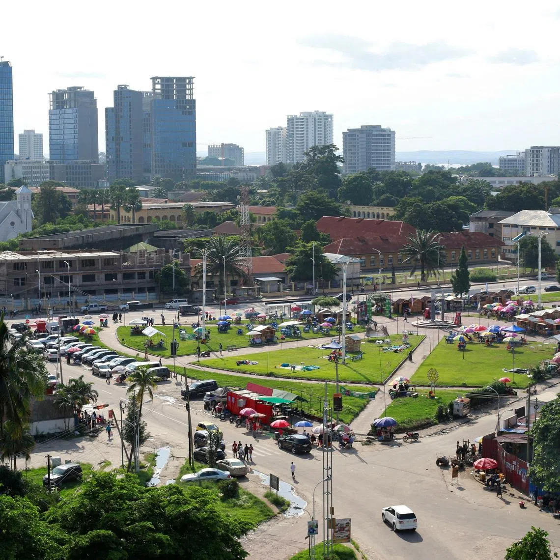 FILE PHOTO: A view shows buildings behind a street of the Gombe area, ahead of the announcement of provisional results of the December presidential election, in Kinshasa, Democratic Republic of Congo December 30, 2023. REUTERS/Justin Makangara/File Photo