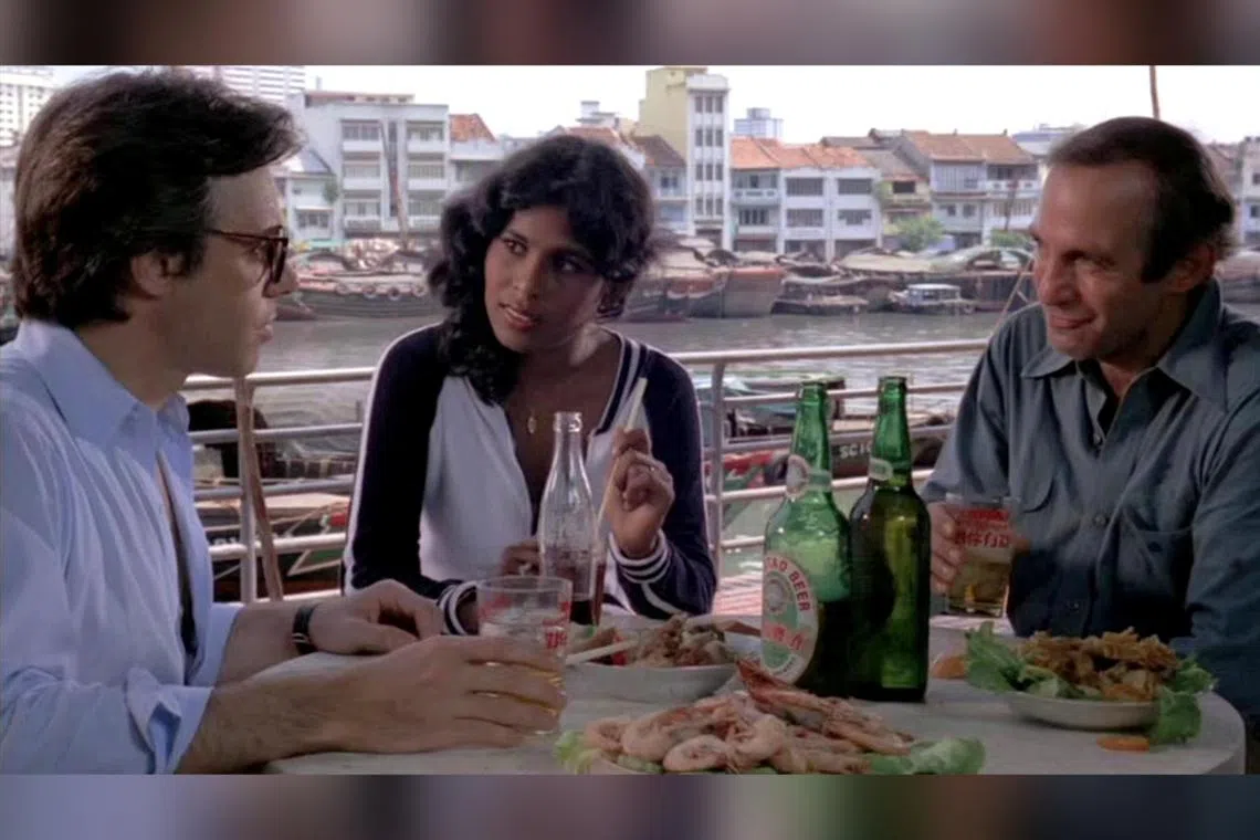 (From left) Peter Bogdanovich, Monika Subramaniam and Ben Gazzara in Saint Jack, at the former Empress Place Food Centre. 