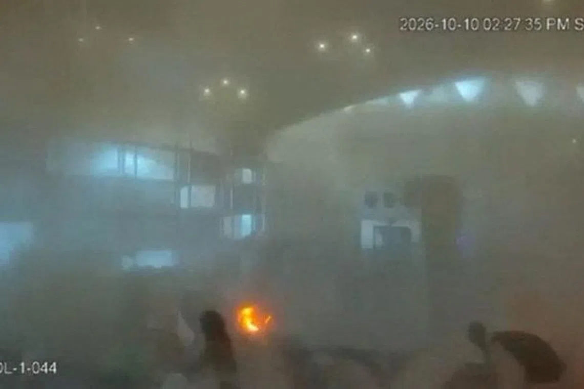 Surveillance footage showing smoke and fire at the moment of an attack at King Khalid International Airport in Riyadh, Saudi Arabia, on Oct 10.
