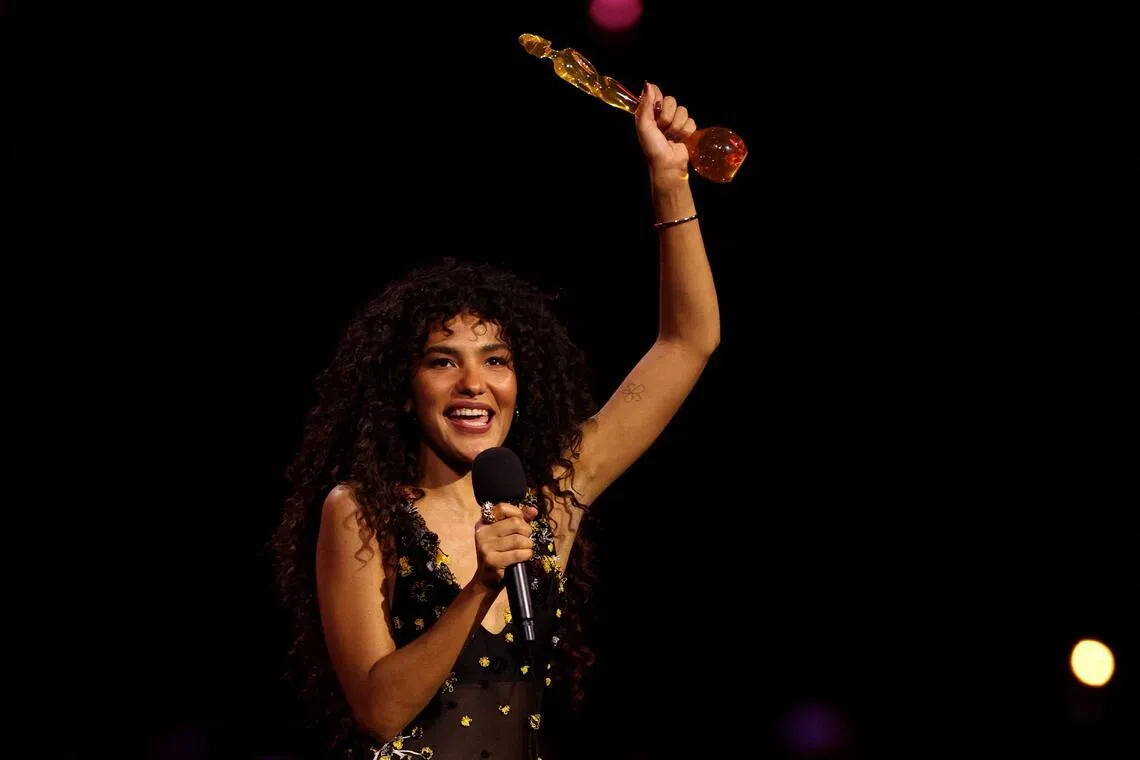 British singer Olivia Dean speaks on stage after receiving the award for best Pop act during the Brit Awards 2026 at the Co-op Live arena, in Manchester on Feb 28.