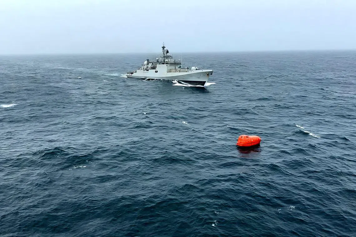 Eight Indians and one Sri Lankan were rescued from the stricken tanker by an Indian warship (above) sent to the scene.