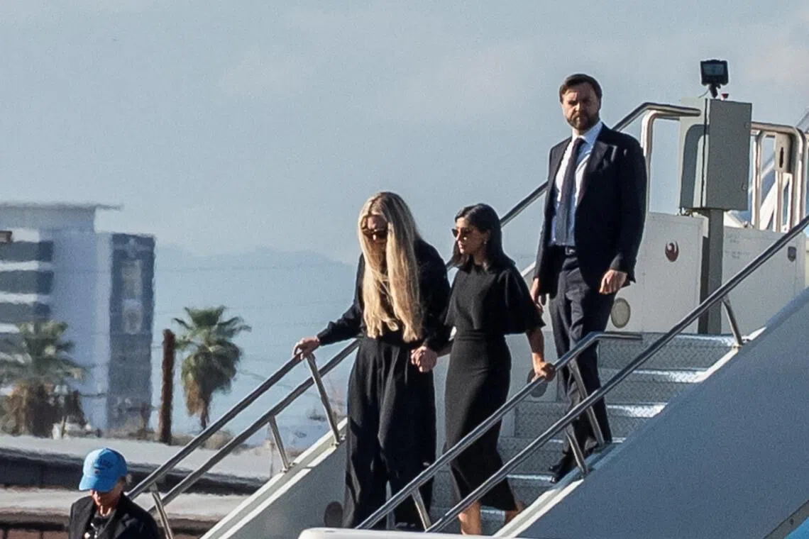 US Vice-President J.D. Vance arriving in Phoenix, Arizona, with his wife Usha Vance (right) and Ms Erika Frantzve, the wife of slain conservative activist Charlie Kirk, on Sept 11.