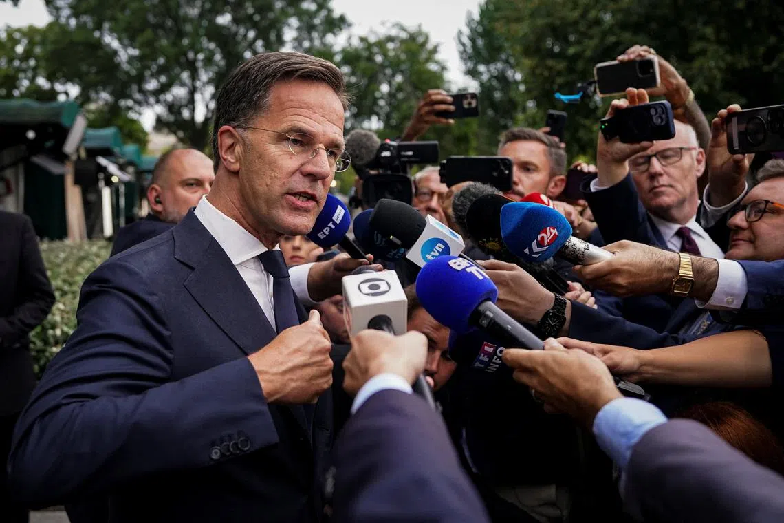 NATO Secretary General Mark Rutte speaks with journalists following a television interview at the White House on the day of U.S. President Donald Trump's meeting with Ukrainian President Volodymyr Zelenskiy and European leaders amid negotiations to end the Russian war in Ukraine, in Washington, D.C., U.S., August 18, 2025. REUTERS/Al Drago