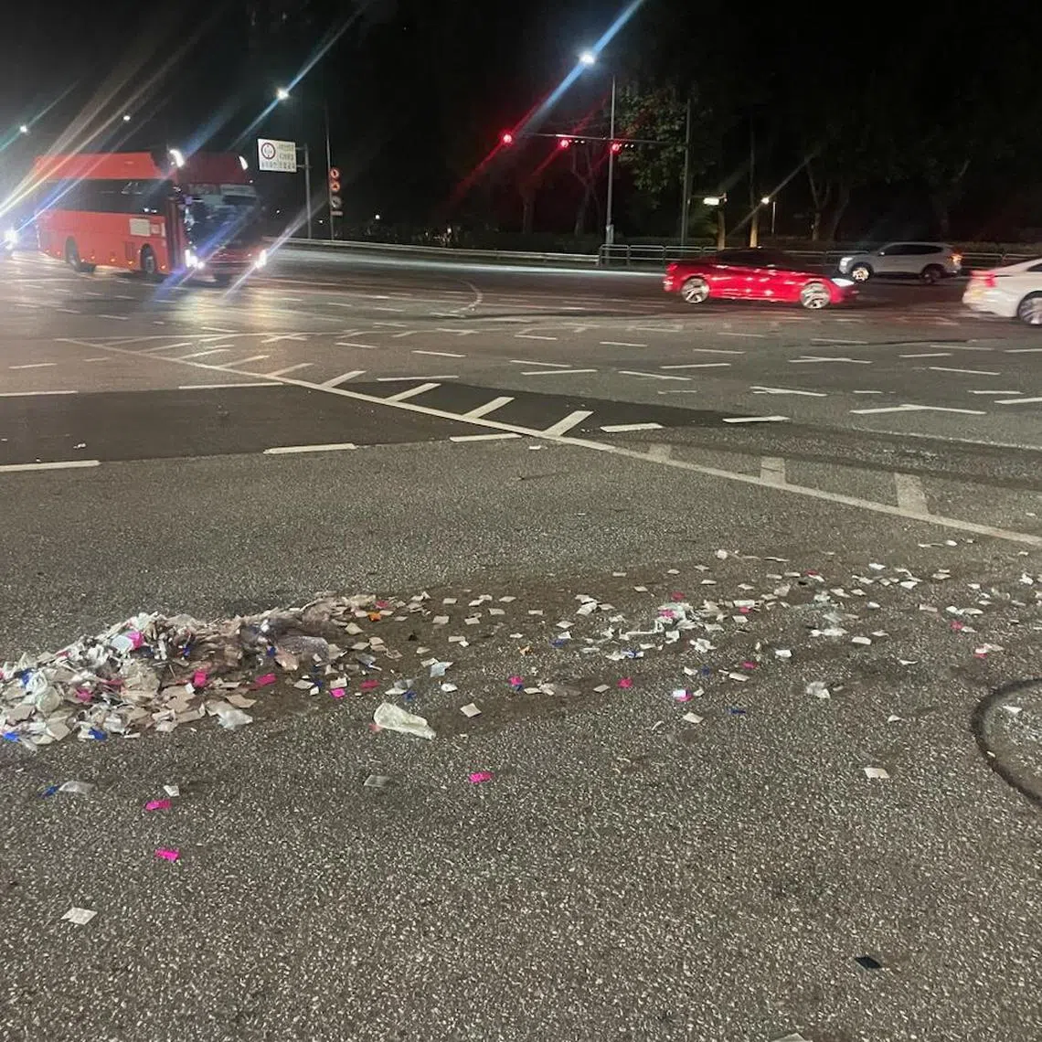 A handout photo shows garbage carried by balloons, presumably sent by North Korea, along a street in Seoul.
