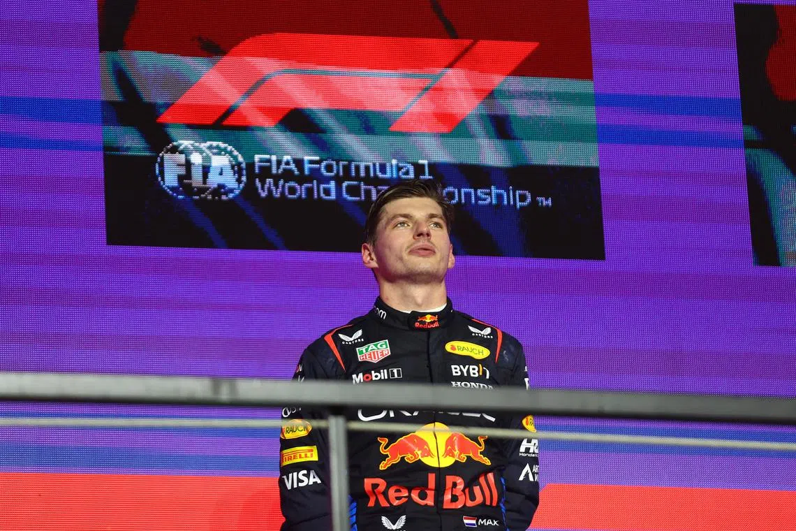 FILE PHOTO: Formula One F1 - Saudi Arabian Grand Prix - Jeddah Corniche Circuit, Jeddah, Saudi Arabia - March 9, 2024 Red Bull's Max Verstappen on the podium after winning the Saudi Arabian Grand Prix REUTERS/Rula Rouhana/FILE PHOTO