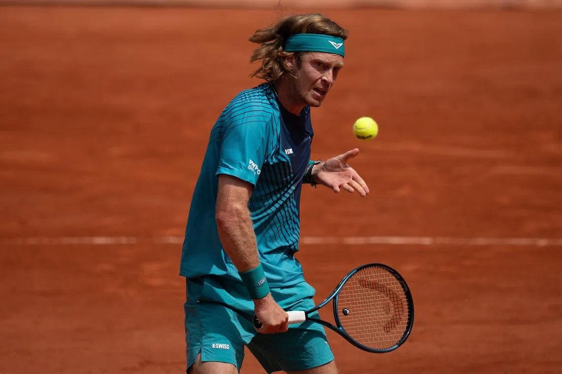 May 29, 2026; Paris, France; Andrey Rublev returns a shot during his match against Nuno Borges of Portugal on day six at Stade Roland Garros. Mandatory Credit: Susan Mullane-Imagn Images