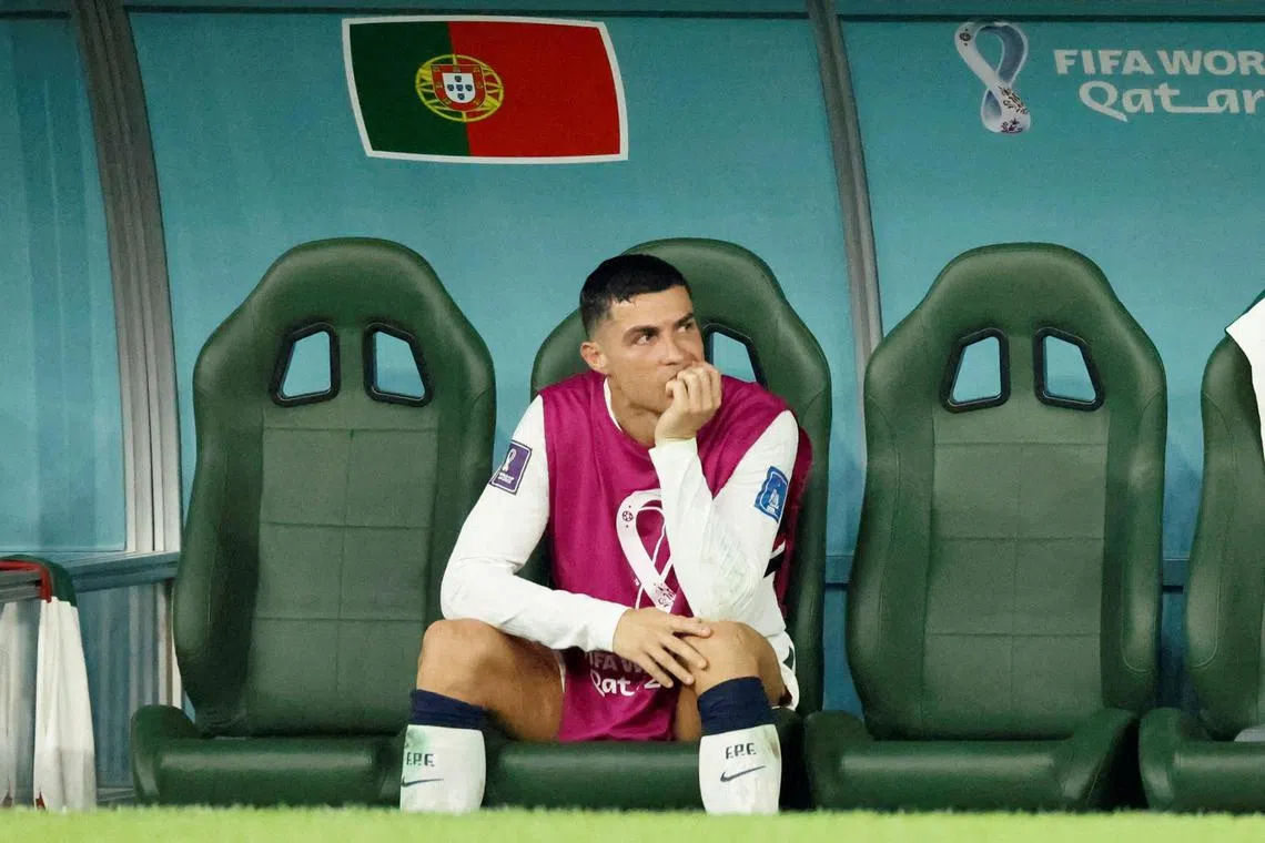 Cristiano Ronaldo on the bench after being substituted in the 2-1 defeat to South Korea on Dec 2.