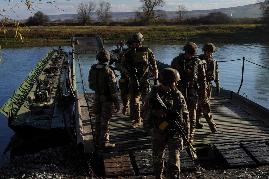 French soldiers take part in a European military exercise in Santimbru, Romania, November 9, 2025. REUTERS/Andreea Campeanu/File Photo