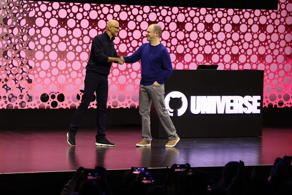 GitHub chief executive Thomas Dohmke (right) got a surprise visit from his boss, Microsoft chief executive Satya Nadella at GitHub Universe in October 2023, where developers were given a sneak of Copilot Workspace, which they subsequently said they didn't like its over-clever find and fix its own errors ability. 

kbgit - On the cusp of Gen AI-powered growth, GitHub chief executive Thomas Dohmke (right) gets a surprise visit and dream target of one billion users from the boss, Microsoft chief executive Satya Nadella.




Source: GitHub