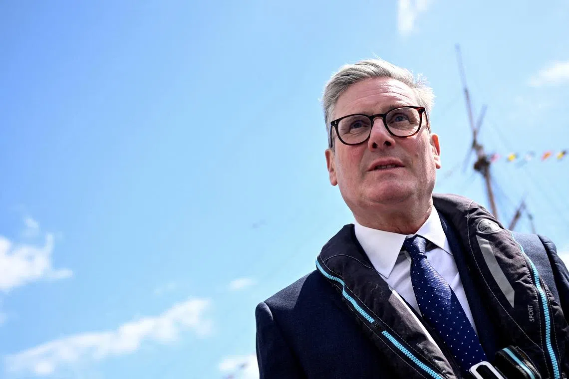 FILE PHOTO: British opposition Labour Party leader Keir Starmer visits the Historic Dockyards in Portsmouth, Britain June 5, 2024. REUTERS/Dylan Martinez/File Photo
