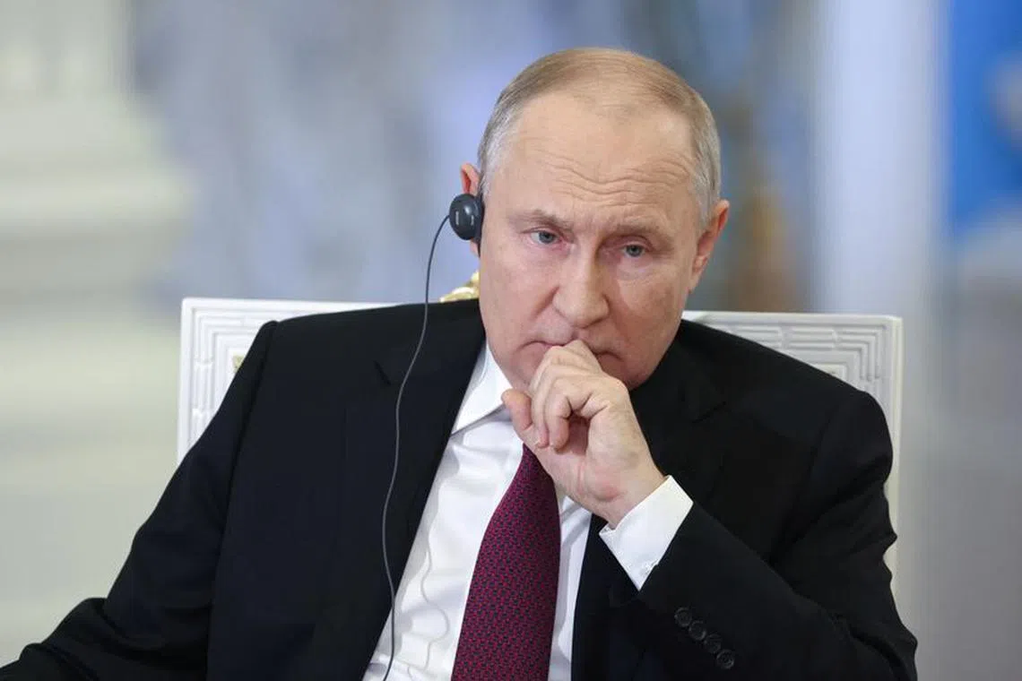 Russian President Vladimir Putin attends an interview with China Media Group anchor Wang Guan at the Kremlin in Moscow, Russia, in this image released October 16, 2023. Sputnik/Sergei Bobylev/Pool via REUTERS/File Photo