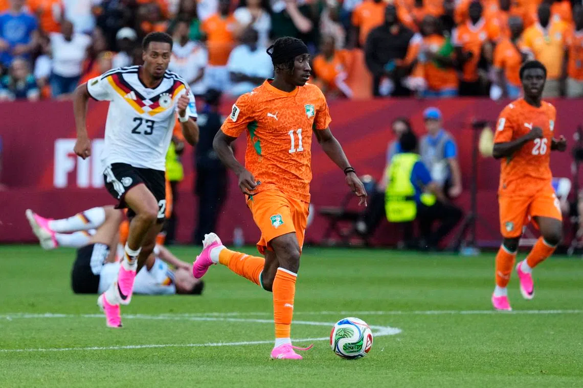 Soccer Football - FIFA World Cup 2026 - Group E - Germany v Ivory Coast - Toronto Stadium, Toronto, Canada - June 20, 2026 Ivory Coast's Yan Diomande in action with Germany's Felix Nmecha IMAGN IMAGES via Reuters/Kevin Sousa