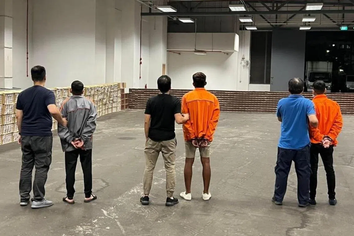 Three of the men were nabbed after Customs officers raided a unit in an industrial building at Sunview Road.