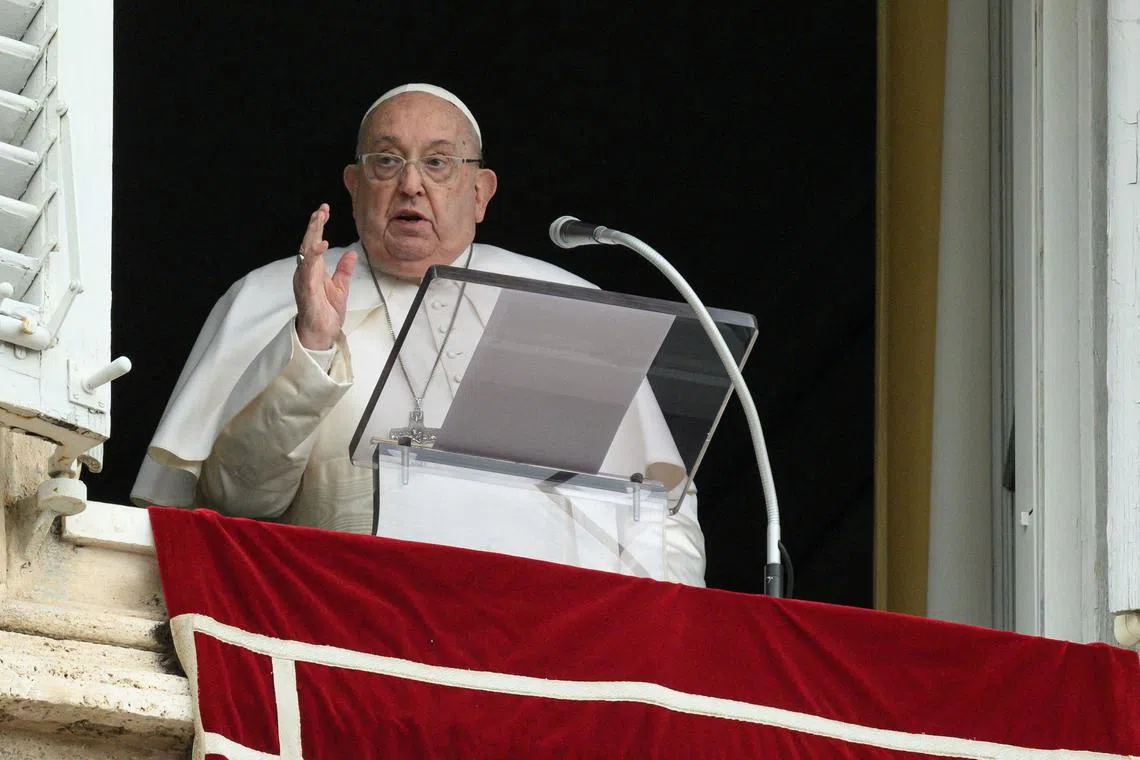Pope Francis leads the Angelus prayer from his window at the Vatican, following a ceasefire between Israel and Hamas, January 19, 2025. Vatican Media/Simone Risoluti/­Handout via REUTERS