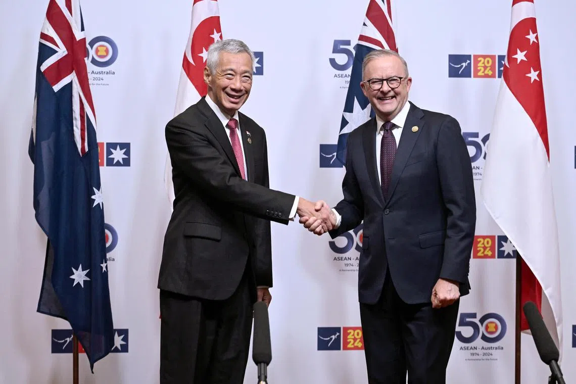 Australian Prime Minister Anthony Albanese (right) greeting Singapore Prime Minister  Lee Hsien Loong ahead of a bilateral meeting during the 2024 Asean-Australia Special Summit at the Melbourne Convention and Exhibition Centre on March 5.