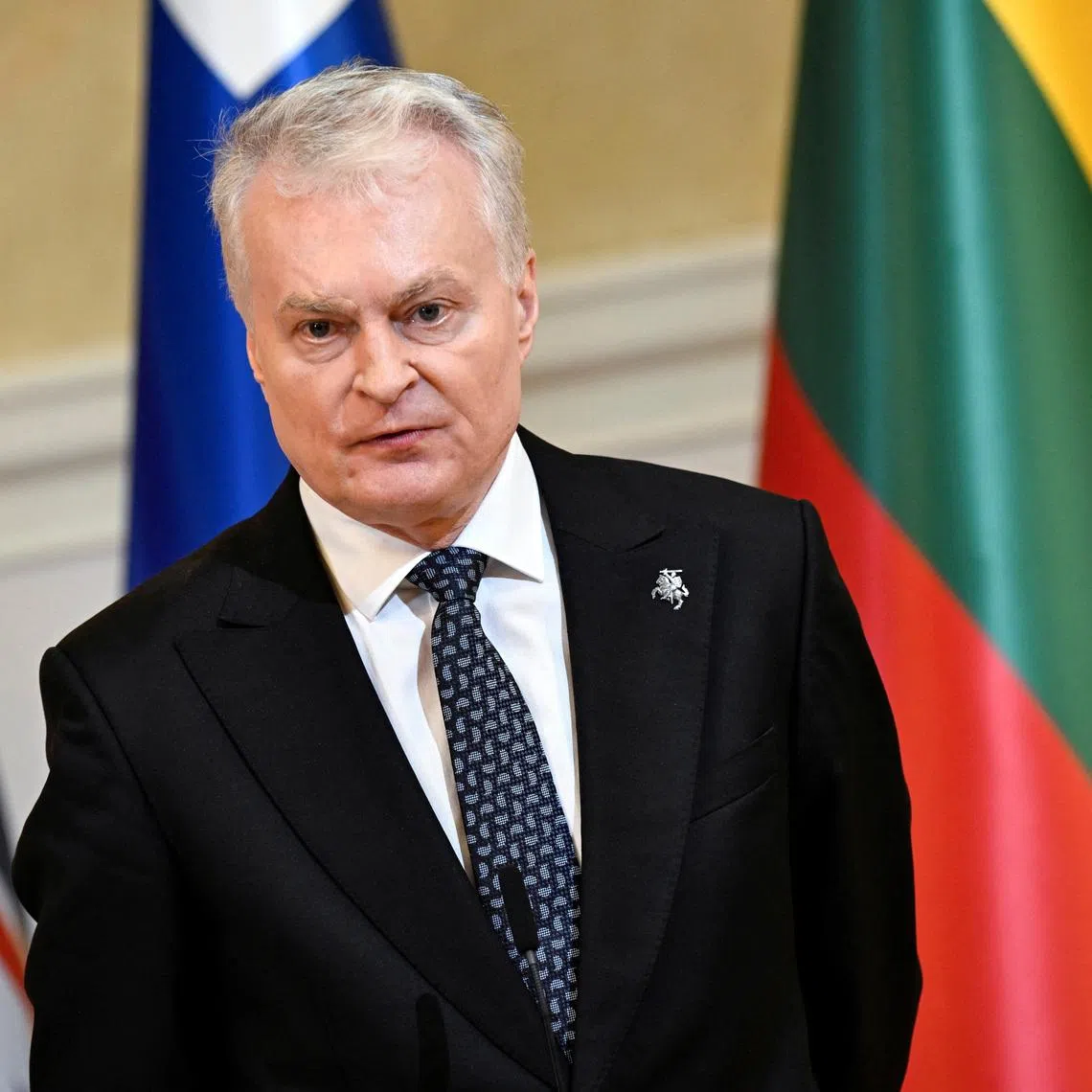 Lithuanian President Gitanas Nauseda gives doorstep comments at the Joint Expeditionary Force JEF Leaders' Summit in Helsinki, Finland March 26, 2026. The topics on the agenda include support from the JEF countries to Ukraine and the overall security situation in Europe. Lehtikuva/Emmi Korhonen via REUTERS      ATTENTION EDITORS - THIS IMAGE WAS PROVIDED BY A THIRD PARTY. NO THIRD PARTY SALES. NOT FOR USE BY REUTERS THIRD PARTY DISTRIBUTORS. FINLAND OUT. NO COMMERCIAL OR EDITORIAL SALES IN FINLAND.