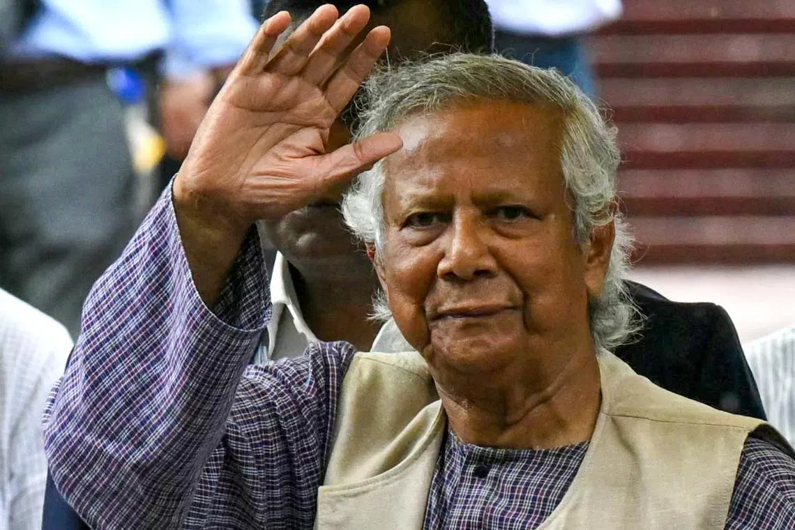 Nobel laureate and chief adviser of Bangladesh's new interim government, Muhammad Yunus, greets the public after laying a wreath at the National Martyrs' Memorial in Dhaka on Aug 9. 