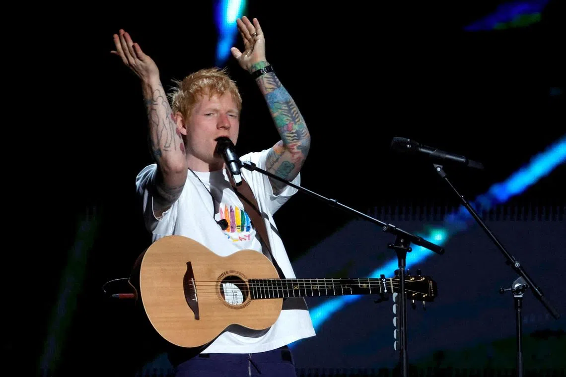 FILE PHOTO: Ed Sheeran performs during the second day of the iHeartRadio Music Festival at T-Mobile Arena in Las Vegas, Nevada, U.S. September 20, 2025. REUTERS/Steve Marcus/File Photo