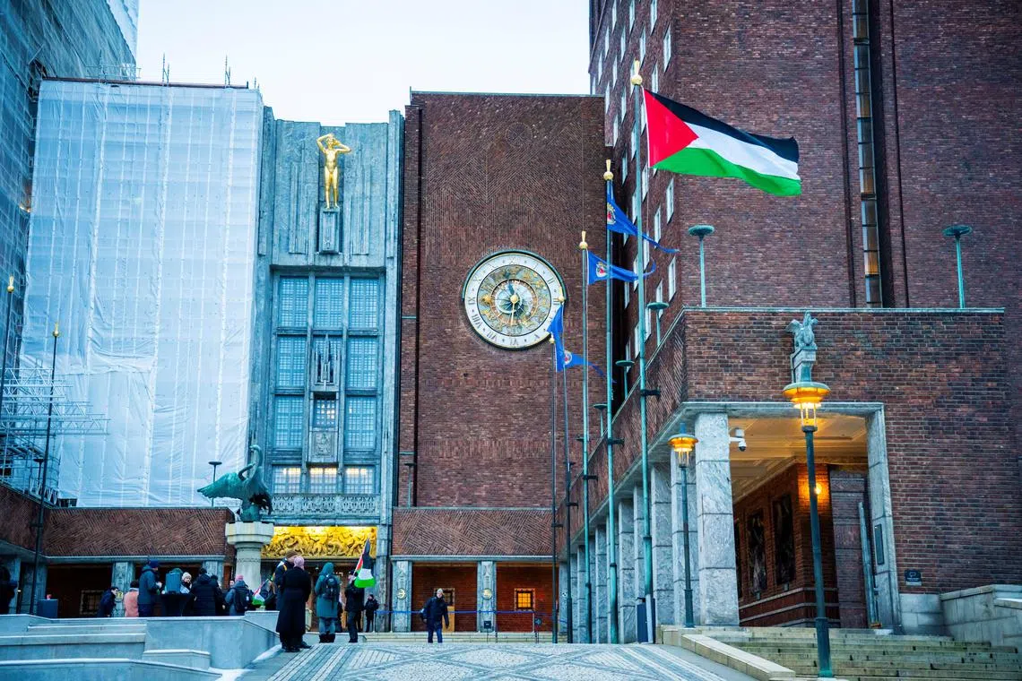 FILE PHOTO: The Palestinian flag was raised in the courtyard outside Oslo City Hall on Wednesday morning in Oslo, Norway, November 29, 2023. NTB/Ole Berg-Rusten/via REUTERS/File Photo