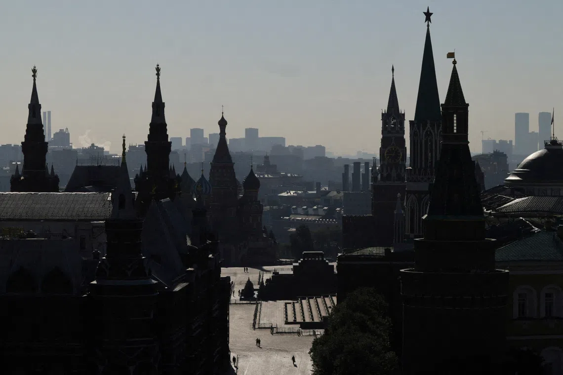 FILE PHOTO: People walk through Red Square near Kremlin towers, St. Basil's Cathedral and the State Historical Museum in Moscow, Russia, September 10, 2026. REUTERS/Anastasia Barashkova/File Photo