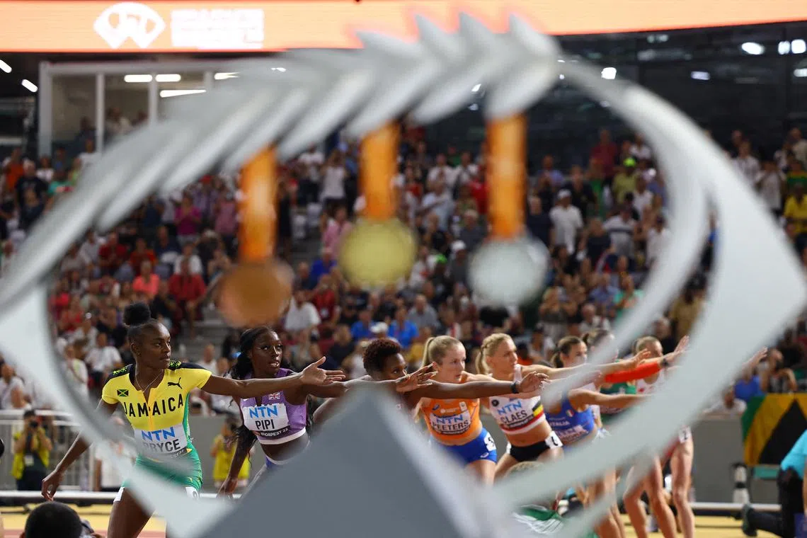 Athletics - World Athletics Championship - Women's 4x400m Relay Final - National Athletics Centre, Budapest, Hungary - August 27, 2023 Netherlands' Cathelijn Peeters, Britain's Ama Pipi and Jamaica's Nickisha Pryce in action during the final REUTERS/Kai Pfaffenbach/File Photo