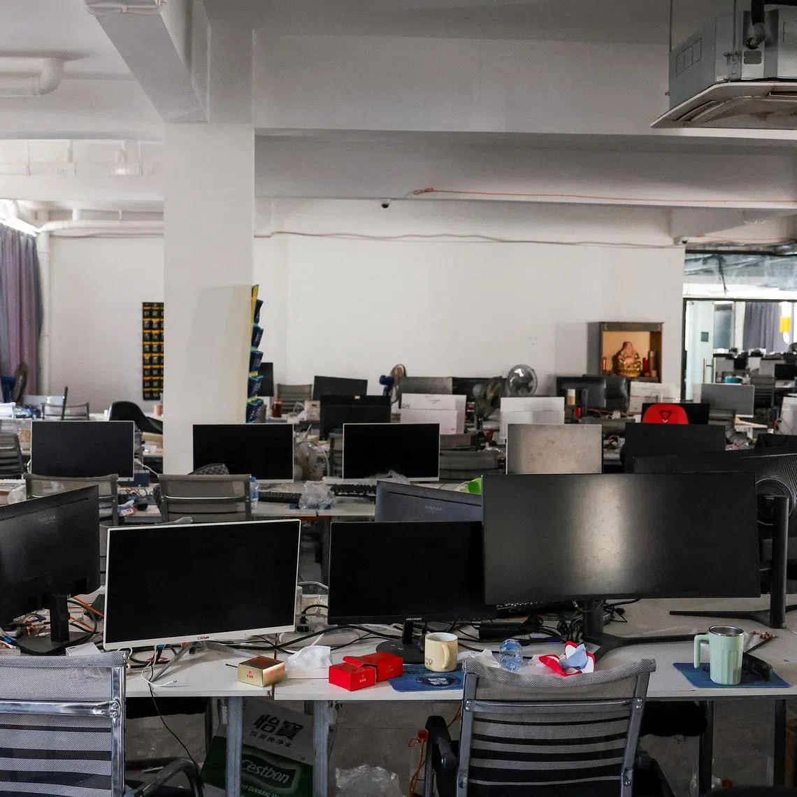 Computer monitors are kept on desks inside a workstation at a compound in O'Smach that the Thai military said was used for scam operations, at the Chong Chom-O'Smach border crossing, after clashes between Thailand and Cambodia in December 2025, in Samraong, Oddar Meanchey province, Cambodia, March 6, 2026. REUTERS/Chalinee Thirasupa