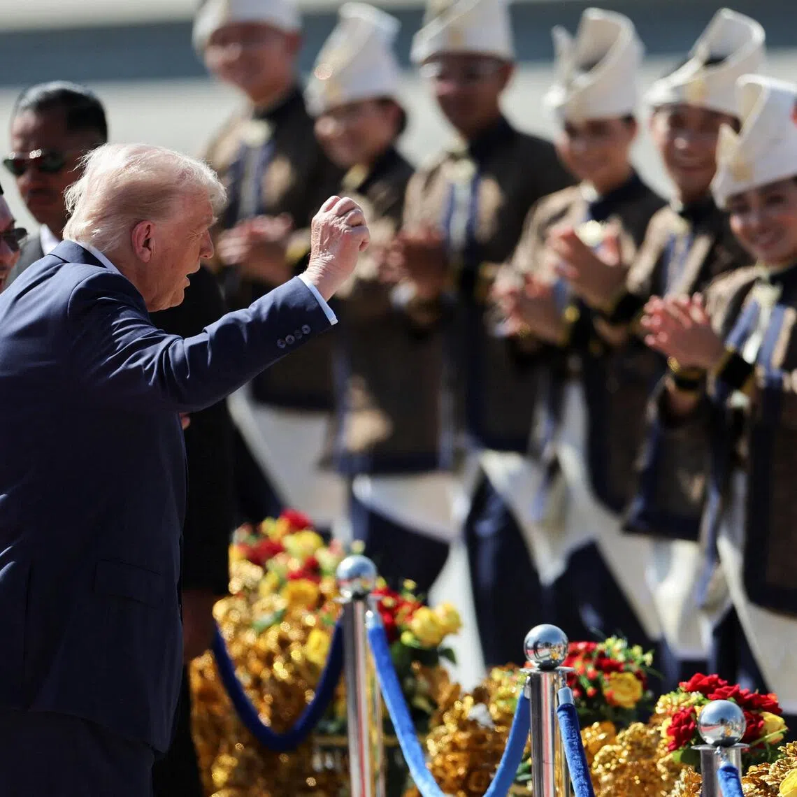 U.S. President Donald Trump joins the performers in a dance during a welcoming ceremony after arriving at Kuala Lumpur International Airport, to attend the 47th Association of Southeast Asian Nations (ASEAN) Summit, in Kuala Lumpur, Malaysia October 26, 2025. REUTERS/Hasnoor Hussain/Pool